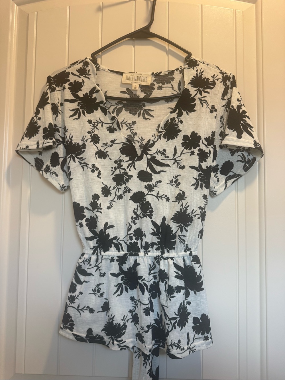Sweet Wanderer Black and White Floral Peplum Top